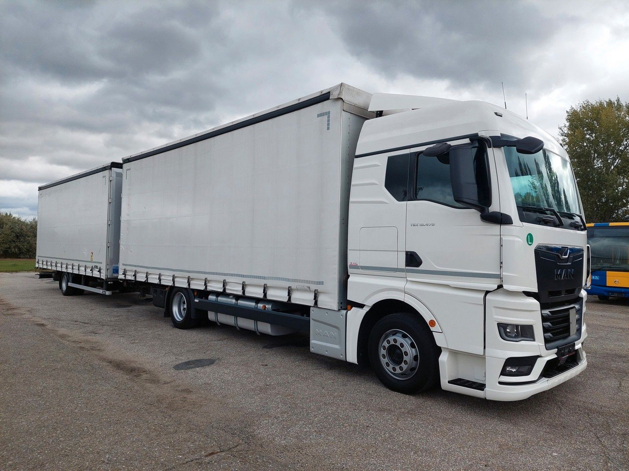 MAN TGX 18.470 LL + Gniotpol G-4080 120 m3 Durchbar - Тентованный грузовик: фото 2 MAN TGX 18.470 LL + Gniotpol G-4080 120 m3 Durchbar - Тентованный грузовик: фото 2