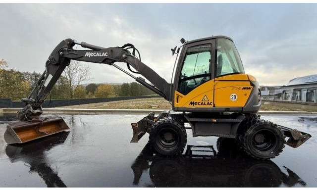 Mecalac 714 MW - Колёсный экскаватор: фото 1 Mecalac 714 MW - Колёсный экскаватор: фото 1