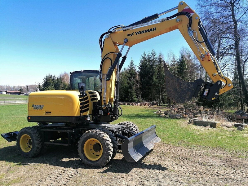 Yanmar B110 W - Колёсный экскаватор: фото 1 Yanmar B110 W - Колёсный экскаватор: фото 1