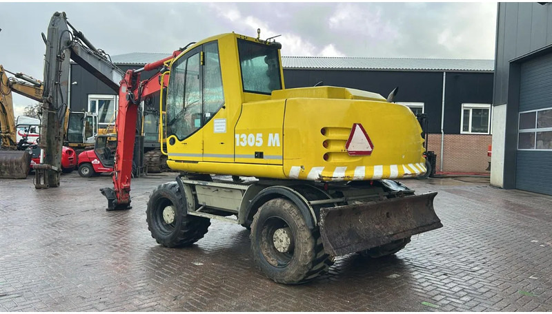 Atlas 1305 - Колёсный экскаватор: фото 4 Atlas 1305 - Колёсный экскаватор: фото 4