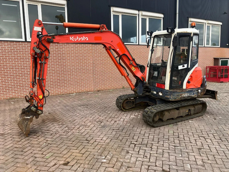 Kubota KX121-3a - Мини-экскаватор: фото 1 Kubota KX121-3a - Мини-экскаватор: фото 1