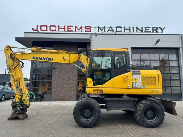 Komatsu PW140-7 Rototilt - Колёсный экскаватор: фото 1 Komatsu PW140-7 Rototilt - Колёсный экскаватор: фото 1