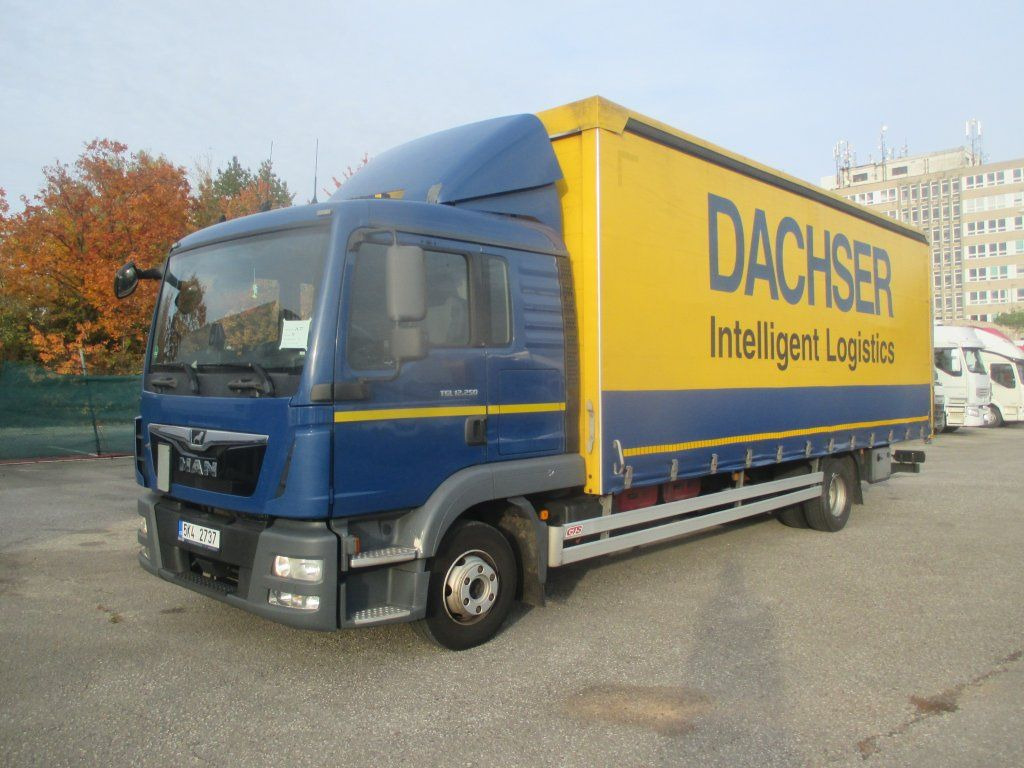 MAN TGL 12.250 - Тентованный грузовик: фото 1 MAN TGL 12.250 - Тентованный грузовик: фото 1