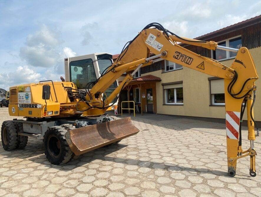 Колёсный экскаватор Liebherr A310B: фото 7