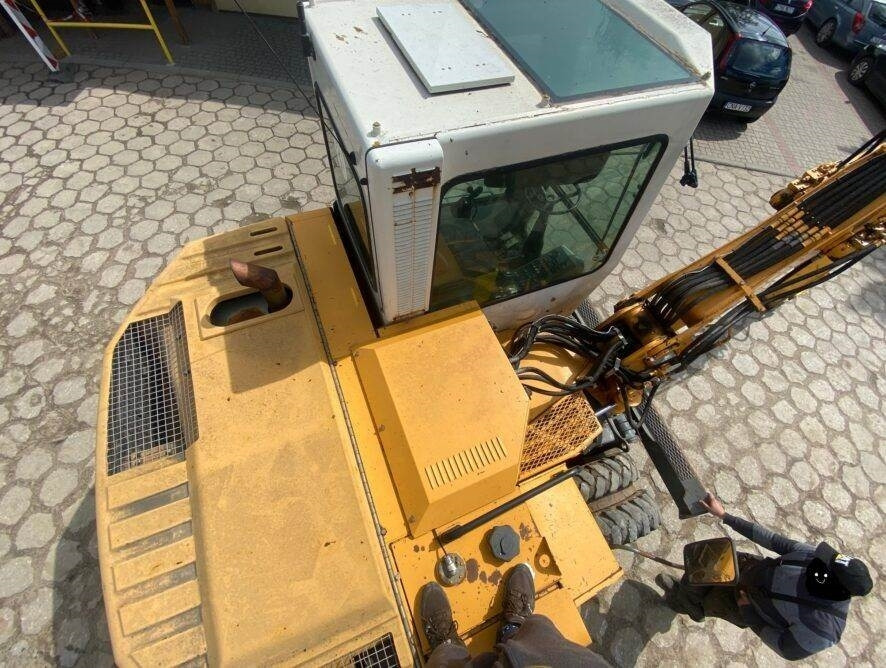 Колёсный экскаватор Liebherr A310B: фото 11