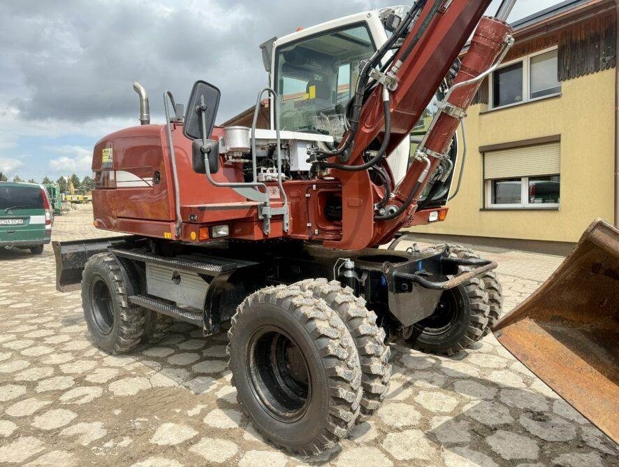 Liebherr A311 Litronic  - Колёсный экскаватор: фото 2 Liebherr A311 Litronic  - Колёсный экскаватор: фото 2