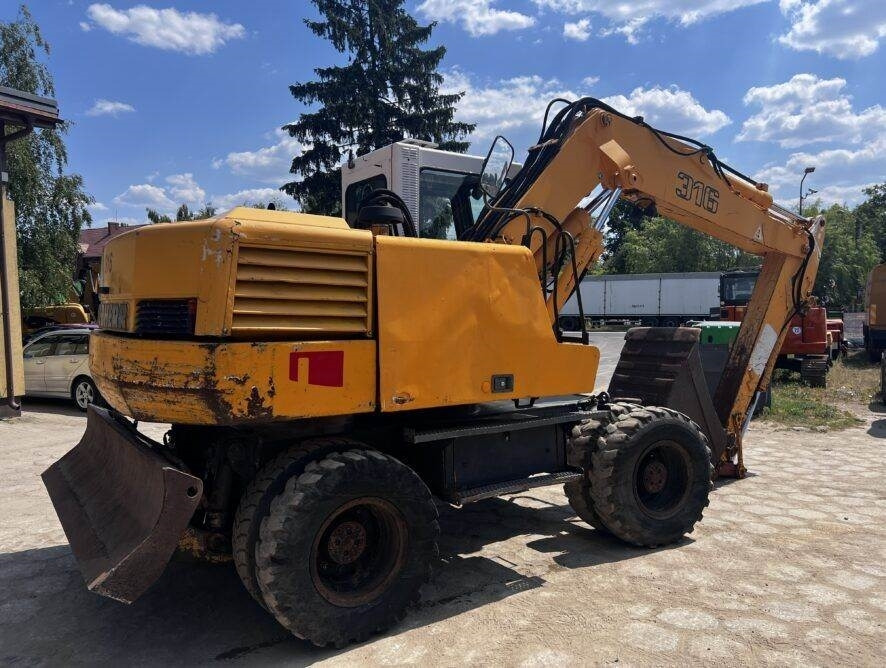 Liebherr A316  - Колёсный экскаватор: фото 5 Liebherr A316  - Колёсный экскаватор: фото 5