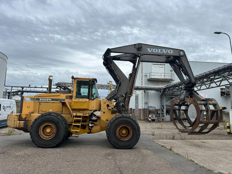 Volvo L180 C High Lift - Лесной прицеп: фото 1 Volvo L180 C High Lift - Лесной прицеп: фото 1
