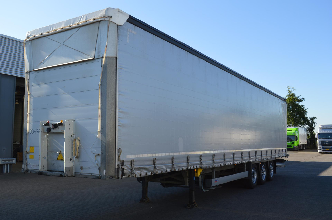 Schmitz Cargobull SCS24/L Varios - Тентованный полуприцеп: фото 1 Schmitz Cargobull SCS24/L Varios - Тентованный полуприцеп: фото 1