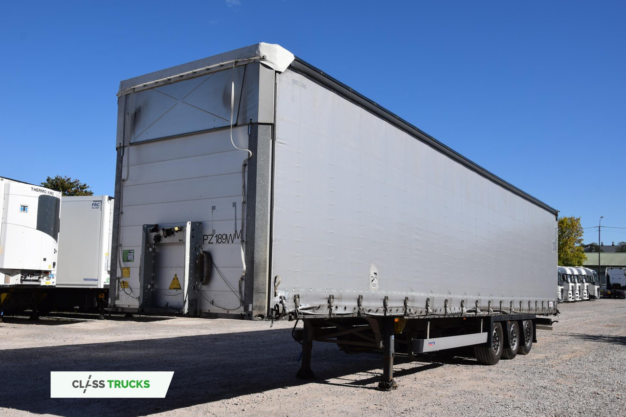 Schmitz Cargobull SCS24/L Varios - Тентованный полуприцеп: фото 1 Schmitz Cargobull SCS24/L Varios - Тентованный полуприцеп: фото 1