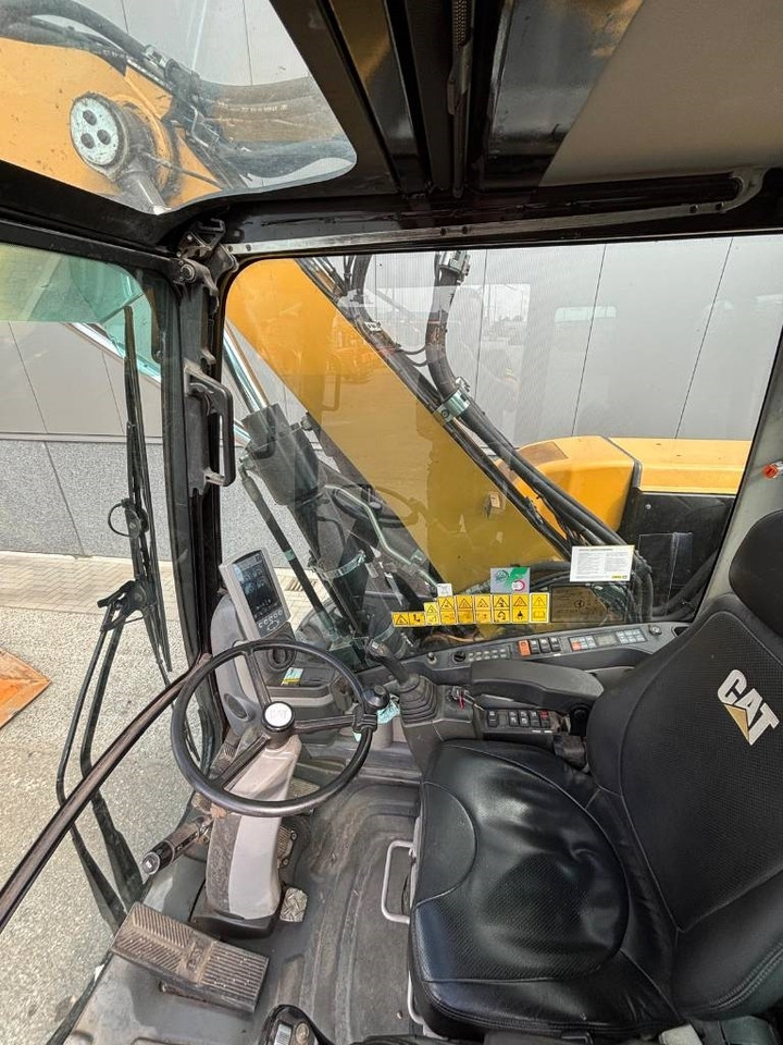 Колёсный экскаватор CAT M 313 D: фото 9