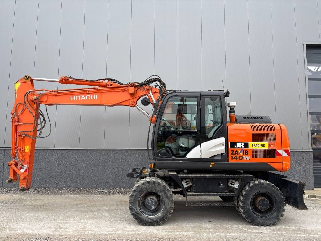 Hitachi ZX 140 W-5B - Колёсный экскаватор: фото 1 Hitachi ZX 140 W-5B - Колёсный экскаватор: фото 1