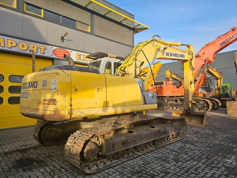 New Holland E215B - Гусеничный экскаватор: фото 4 New Holland E215B - Гусеничный экскаватор: фото 4