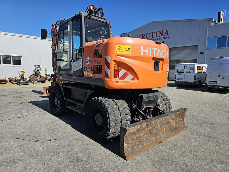 HITACHI ZX145W-3 - Колёсный экскаватор: фото 2 HITACHI ZX145W-3 - Колёсный экскаватор: фото 2