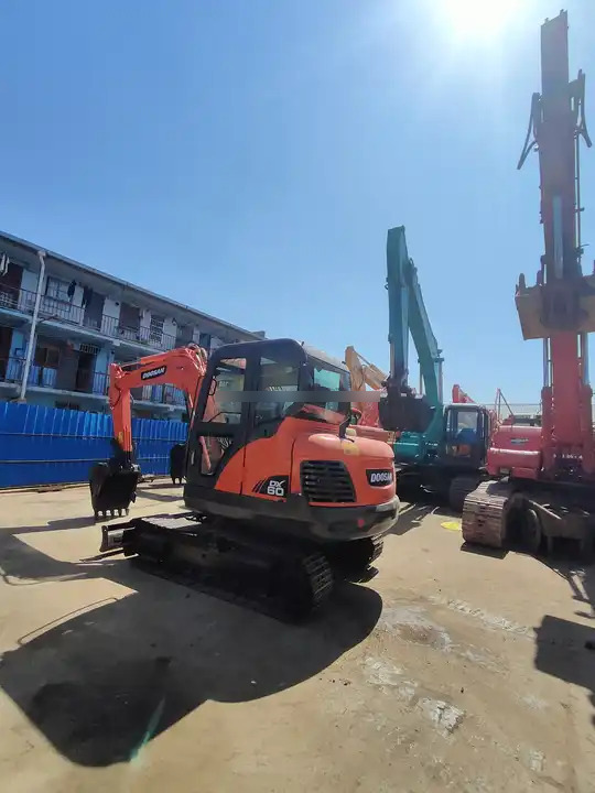 Used excavator doosan dx60 excavators earth-moving machinery doosan dx60 dx80 dx75 dx225 for sale - Гусеничный экскаватор: фото 5 Used excavator doosan dx60 excavators earth-moving machinery doosan dx60 dx80 dx75 dx225 for sale - Гусеничный экскаватор: фото 5
