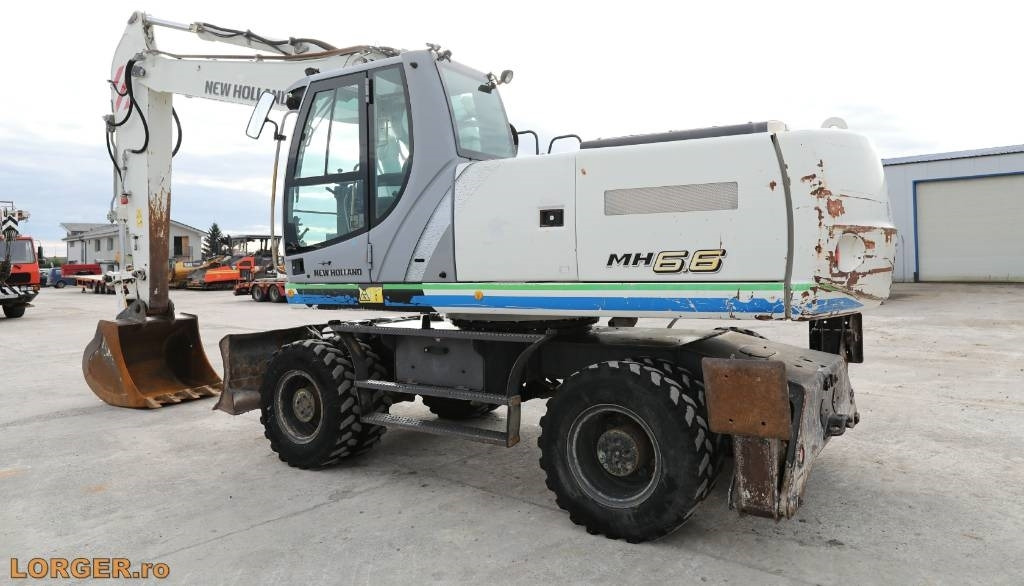 New Holland MH 6.6 + Sandvic Hammer - Колёсный экскаватор: фото 3 New Holland MH 6.6 + Sandvic Hammer - Колёсный экскаватор: фото 3