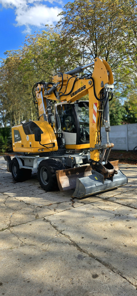 Liebherr A 914 COMPACT - Колёсный экскаватор: фото 1 Liebherr A 914 COMPACT - Колёсный экскаватор: фото 1