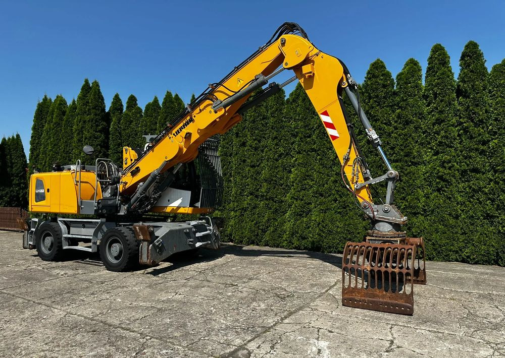 Liebherr LH22 M - Колёсный экскаватор: фото 3 Liebherr LH22 M - Колёсный экскаватор: фото 3