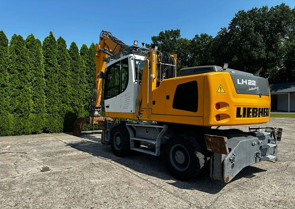 Liebherr LH22 M - Колёсный экскаватор: фото 2 Liebherr LH22 M - Колёсный экскаватор: фото 2