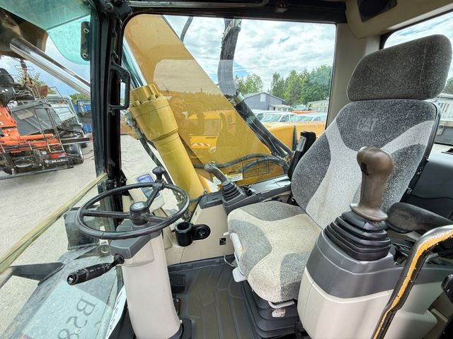 Колёсный экскаватор CAT M 322C: фото 9