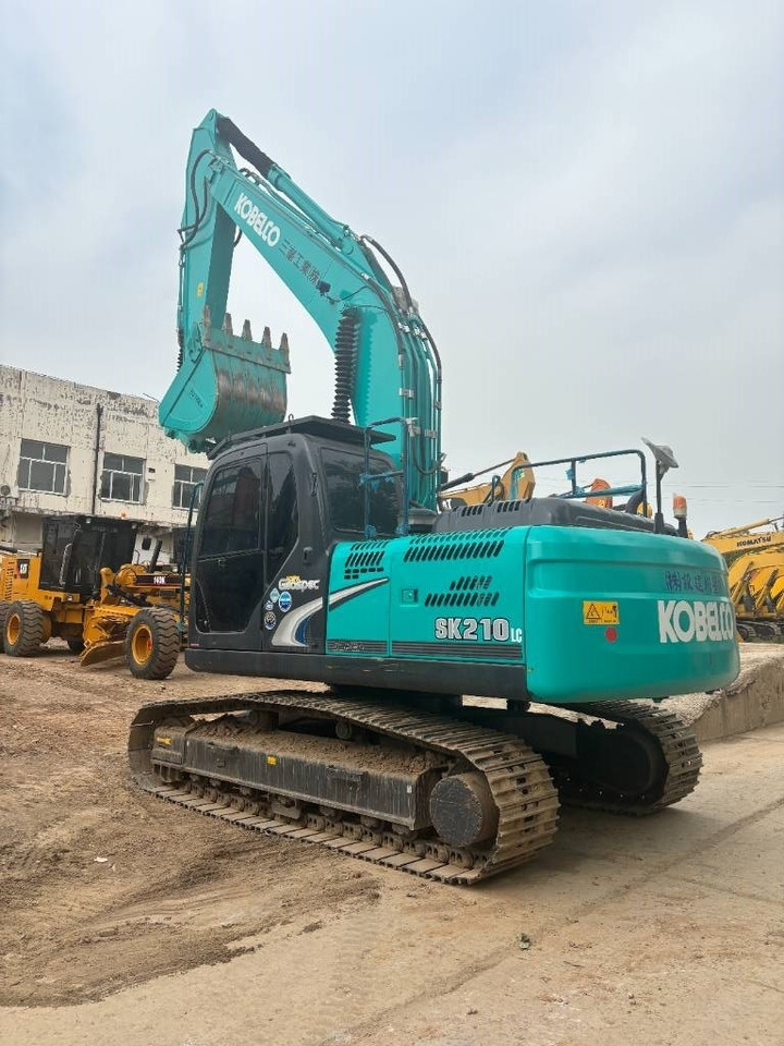 Kobelco SK 210 - Гусеничный экскаватор: фото 5 Kobelco SK 210 - Гусеничный экскаватор: фото 5