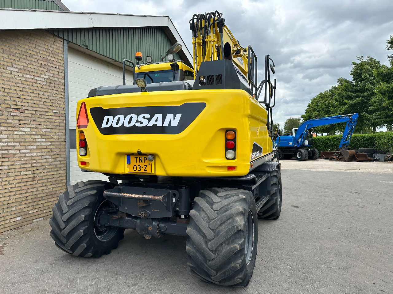 Doosan DX140W-5 - Колёсный экскаватор: фото 5 Doosan DX140W-5 - Колёсный экскаватор: фото 5
