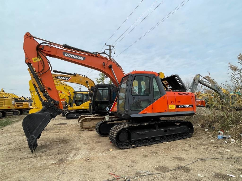 Doosan dx150 - Гусеничный экскаватор: фото 1 Doosan dx150 - Гусеничный экскаватор: фото 1