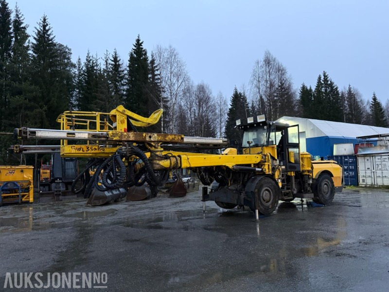 2012 Atlas Copco Boomer E2C Borerigg, To-bom oppsett med integrert kurv - Буровая машина: фото 1 2012 Atlas Copco Boomer E2C Borerigg, To-bom oppsett med integrert kurv - Буровая машина: фото 1