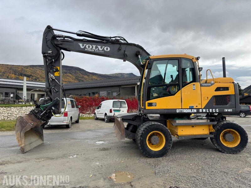 2012 Volvo EW140 D Hjulmaskin TILTROTATOR, 2 SKUFFER, SENTRALSMØRING - Экскаватор: фото 1 2012 Volvo EW140 D Hjulmaskin TILTROTATOR, 2 SKUFFER, SENTRALSMØRING - Экскаватор: фото 1