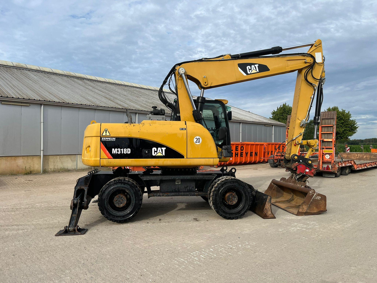 Caterpillar M318D - Колёсный экскаватор: фото 2 Caterpillar M318D - Колёсный экскаватор: фото 2