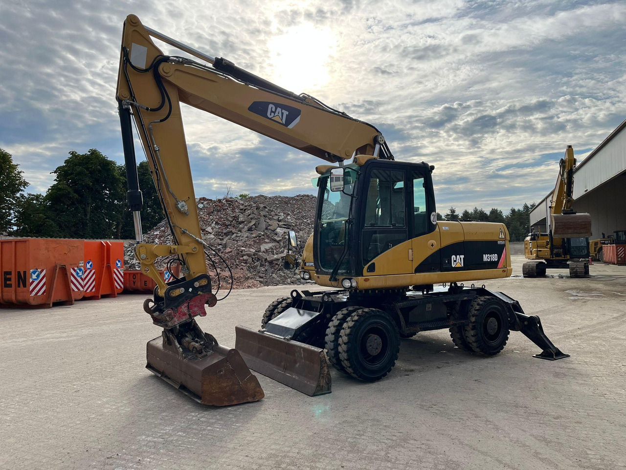 Caterpillar M318D - Колёсный экскаватор: фото 5 Caterpillar M318D - Колёсный экскаватор: фото 5