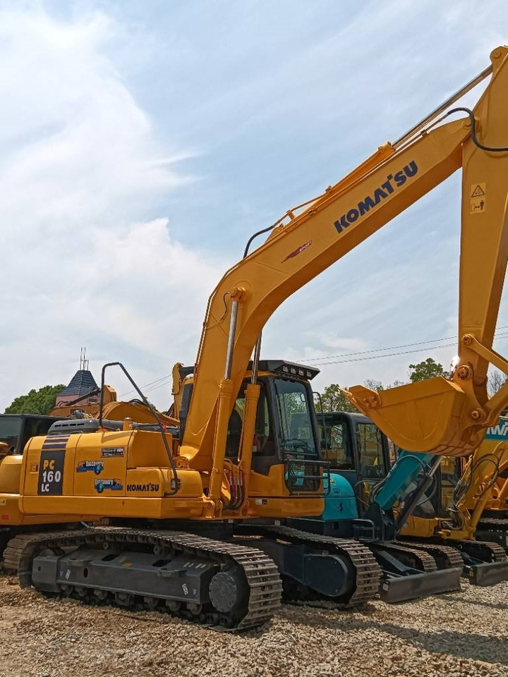 Komatsu PC 160 - Гусеничный экскаватор: фото 2 Komatsu PC 160 - Гусеничный экскаватор: фото 2