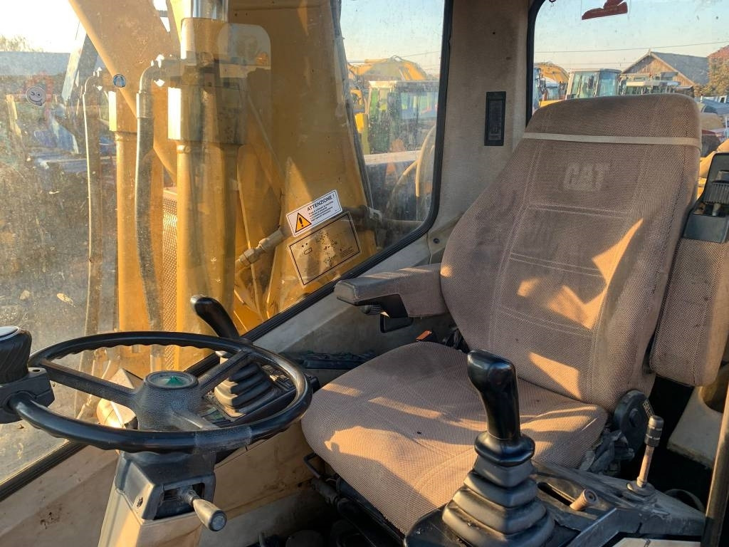 Колёсный экскаватор CAT M 315: фото 8