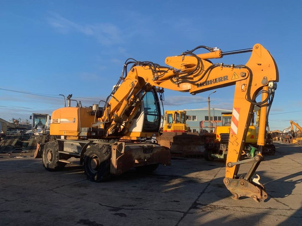 Liebherr A 314 Litronic - Колёсный экскаватор: фото 5 Liebherr A 314 Litronic - Колёсный экскаватор: фото 5