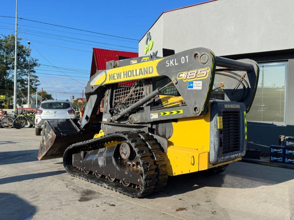 New Holland C 185 - Гусеничный мини-погрузчик: фото 3 New Holland C 185 - Гусеничный мини-погрузчик: фото 3
