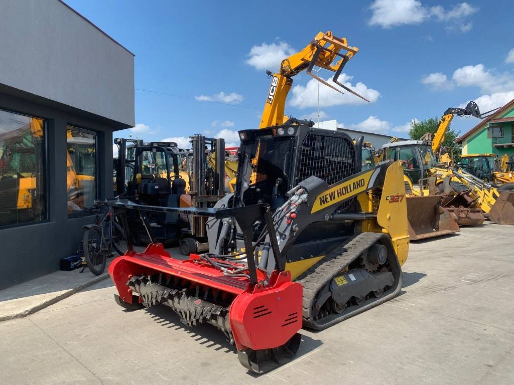 New Holland C327 - Мини-погрузчик с бортовым поворотом: фото 1 New Holland C327 - Мини-погрузчик с бортовым поворотом: фото 1