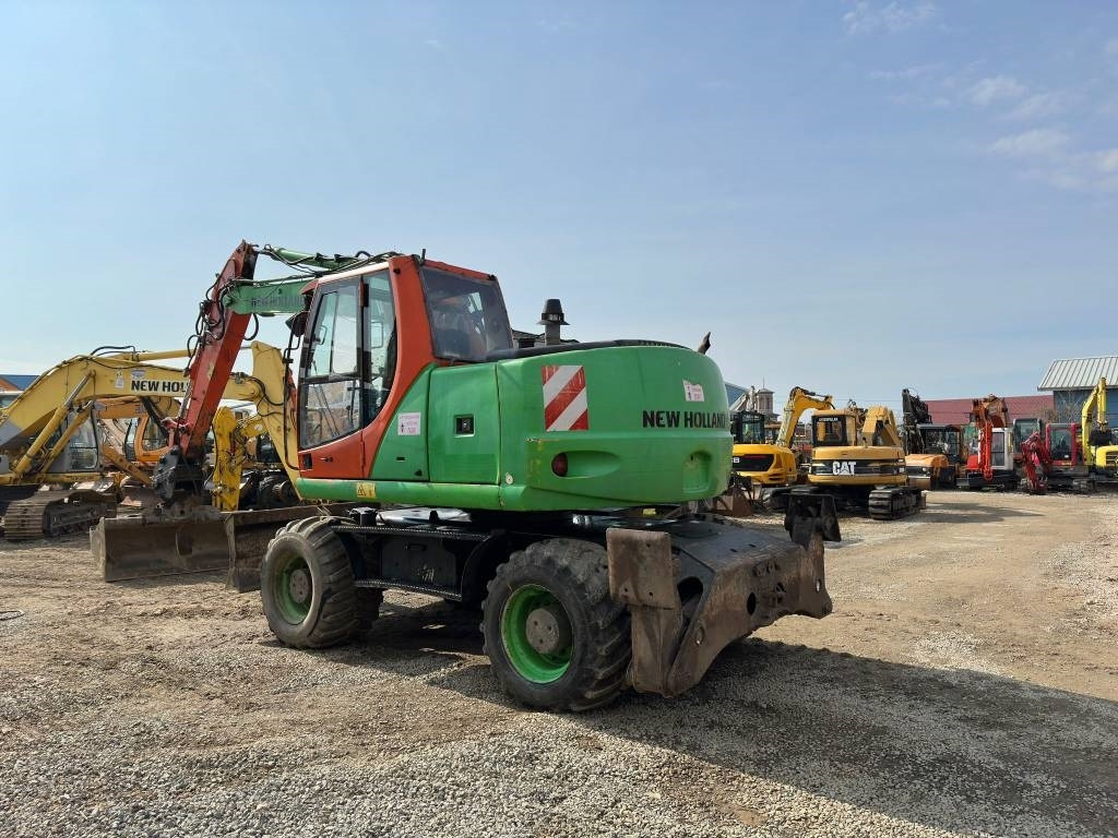 New Holland MH Plus - Колёсный экскаватор: фото 5 New Holland MH Plus - Колёсный экскаватор: фото 5
