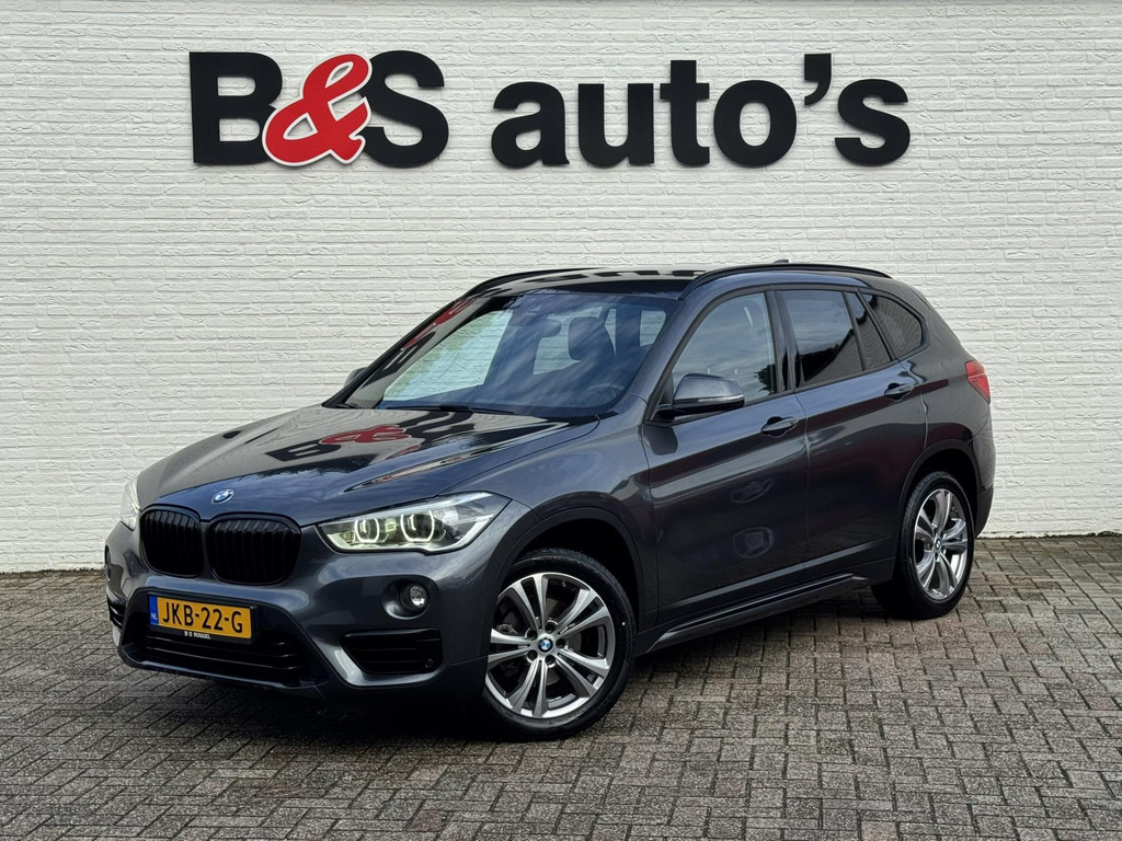 BMW X1-SDrive18i High Executive Automaat Cruise control Climate control Stoelverwarming Navigatie Full LED Head-up display Camera - Внедорожник: фото 1 BMW X1-SDrive18i High Executive Automaat Cruise control Climate control Stoelverwarming Navigatie Full LED Head-up display Camera - Внедорожник: фото 1