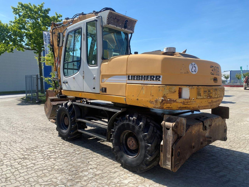 Liebherr A316 Litronic NVT - Колёсный экскаватор: фото 1 Liebherr A316 Litronic NVT - Колёсный экскаватор: фото 1