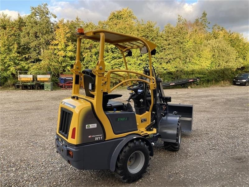 Eurotrac W11 med lang arm, skovl og gafler - Компактный фронтальный погрузчик: фото 3 Eurotrac W11 med lang arm, skovl og gafler - Компактный фронтальный погрузчик: фото 3