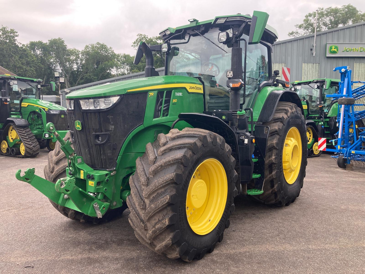 John Deere 7R 310 - Трактор: фото 1 John Deere 7R 310 - Трактор: фото 1