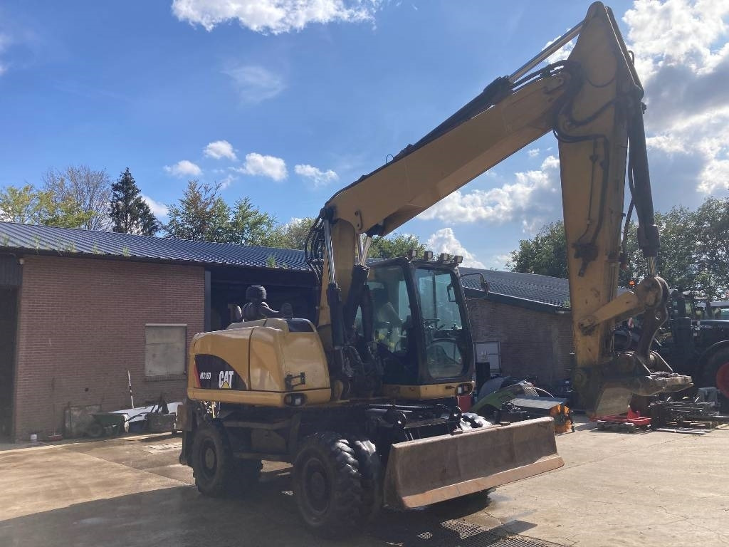 Колёсный экскаватор CAT M 316 D: фото 6