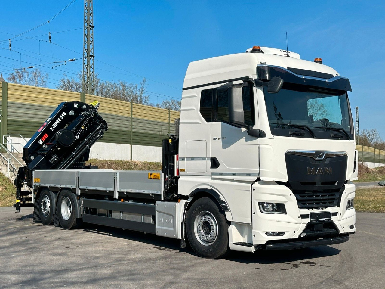 MAN TGX 26.520 TG3 Retarder / 6X2 Hiab 548 E 8 - Грузовик бортовой/ Платформа, Автоманипулятор: фото 1 MAN TGX 26.520 TG3 Retarder / 6X2 Hiab 548 E 8 - Грузовик бортовой/ Платформа, Автоманипулятор: фото 1