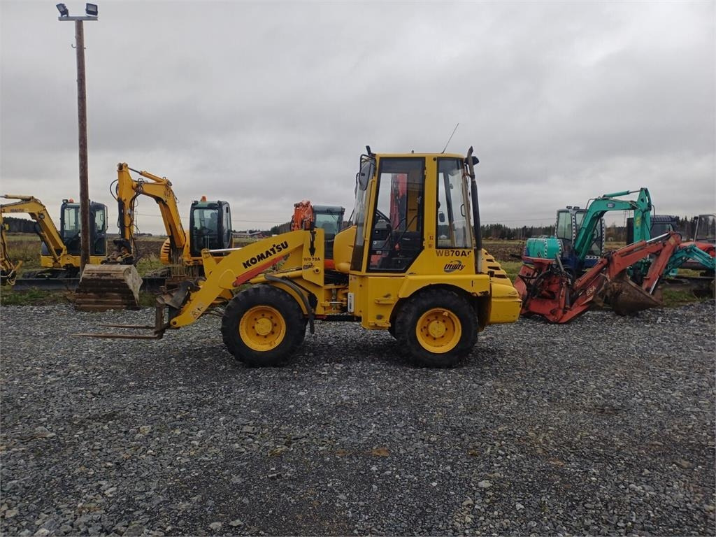 Komatsu WB70A Pyöräkuormaaja - Колёсный погрузчик: фото 2 Komatsu WB70A Pyöräkuormaaja - Колёсный погрузчик: фото 2