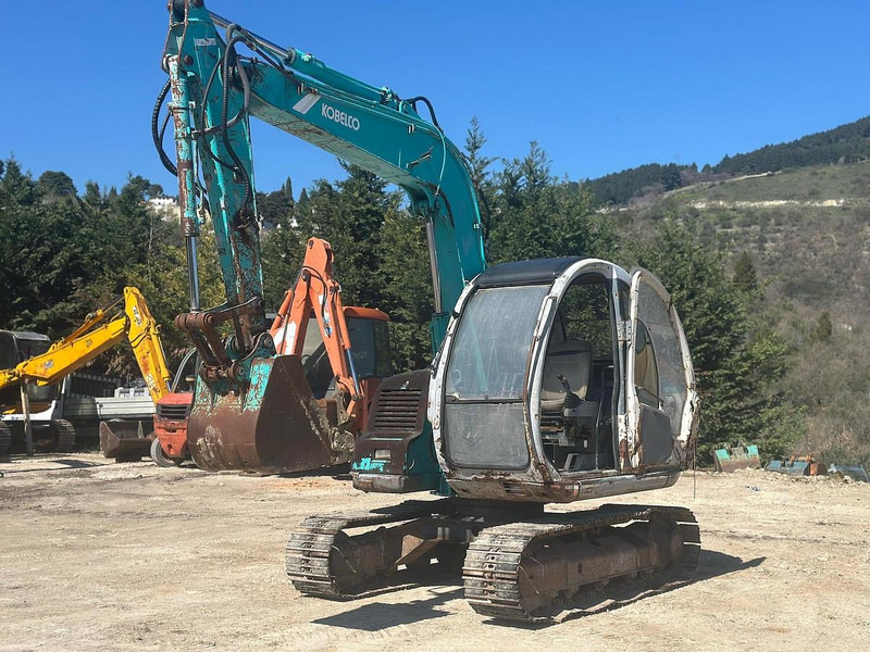 Kobelco SK60 - Экскаватор: фото 1 Kobelco SK60 - Экскаватор: фото 1