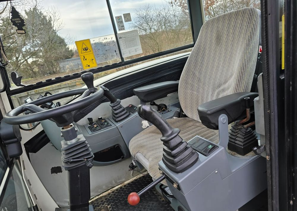 Terex - Колёсный экскаватор: фото 4 Terex - Колёсный экскаватор: фото 4