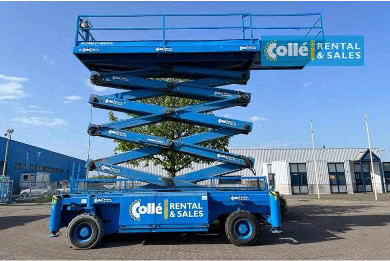 Holland lift M 250 DL 27 | 2003 - Ножничный подъемник: фото 3 Holland lift M 250 DL 27 | 2003 - Ножничный подъемник: фото 3