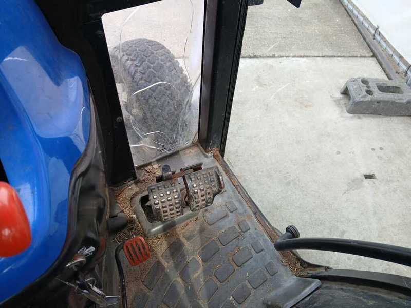 Трактор New Holland TC 27: фото 13 Трактор New Holland TC 27: фото 13