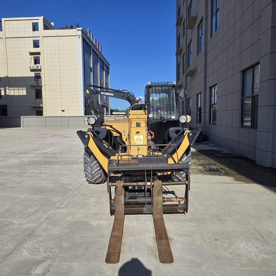 CATERPILLAR TH414 - Телескопический подъемник: фото 4 CATERPILLAR TH414 - Телескопический подъемник: фото 4