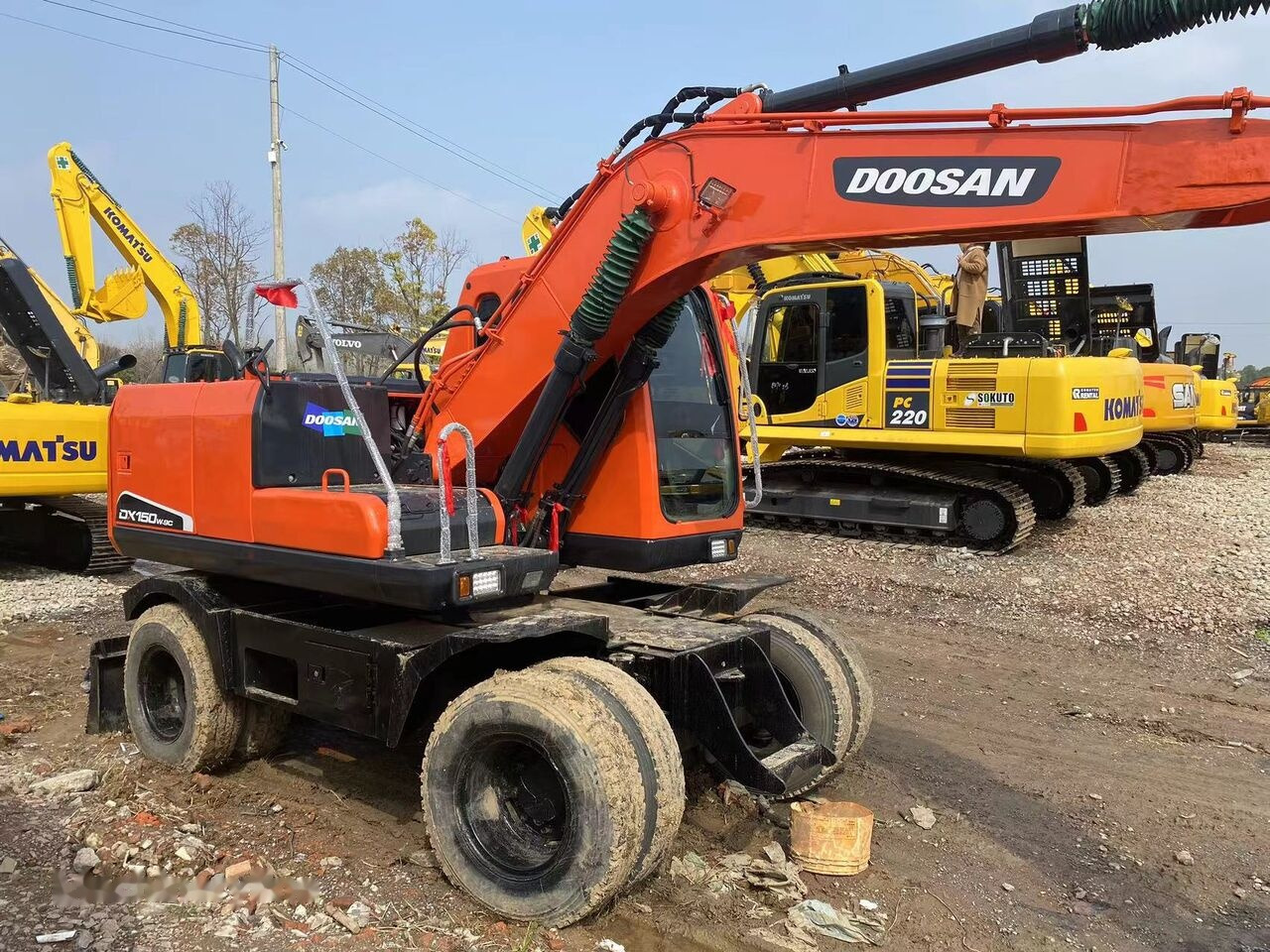 Колёсный экскаватор Doosan DX150W: фото 13
